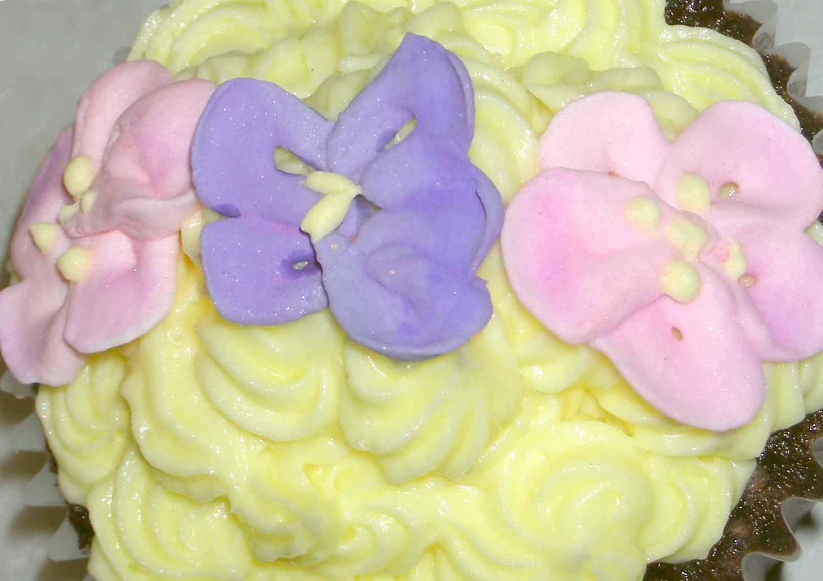 Image of Yellow Cupcake with Flowers